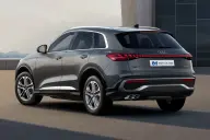 Audi Q5 S line — vista trasera tres cuartos, con el difusor S y las salidas de escape