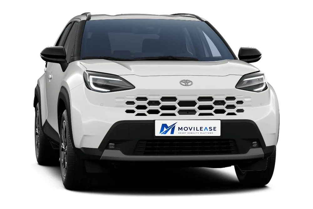 Toyota Yaris Cross 130H Active en blanco, frontal con la parrilla de panal en el color de la carrocería y faros LED